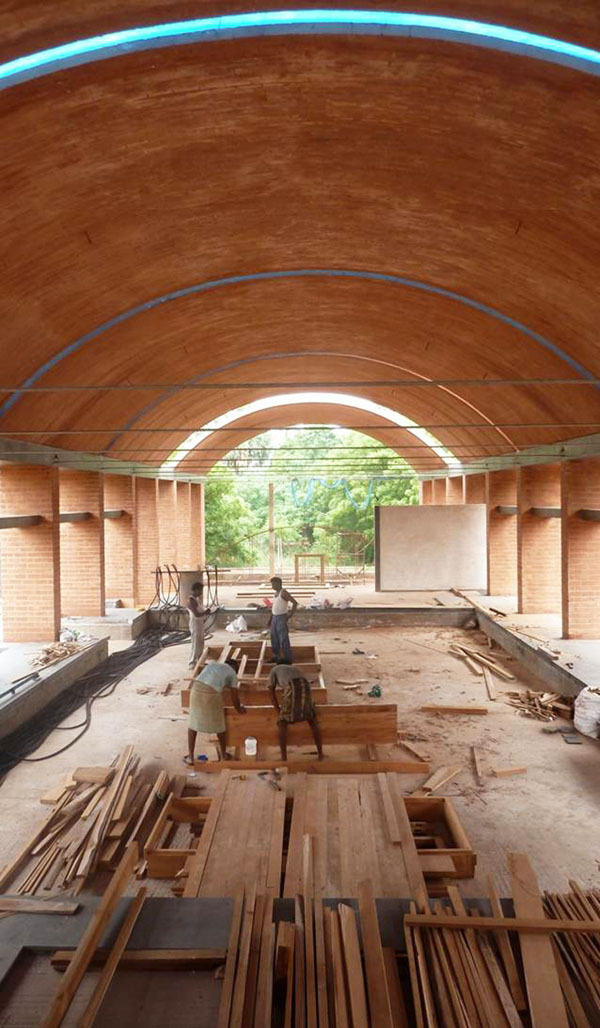 carpentry workshop under large earth vaults inside sharanam pondicherry