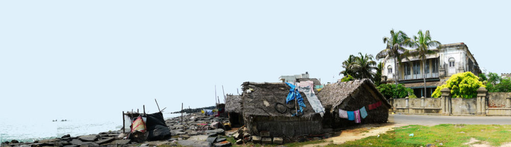 Academy House and fishermens' village, Beach Road, Pondicherry on the Bay of Bengal.