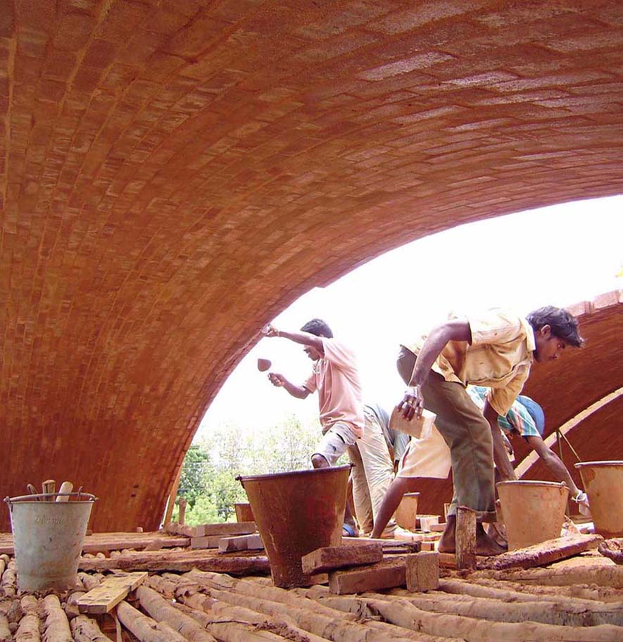 masons building earth vaults at sharanam pondicherry