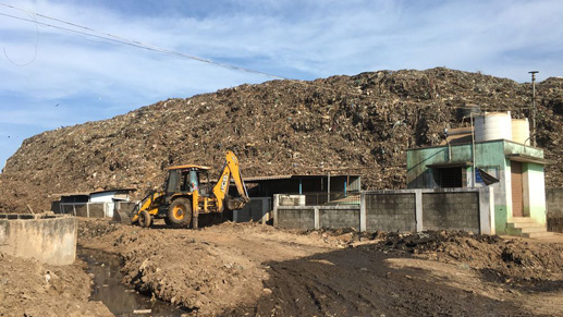 How will the Aurostores project address this nearby mountain of waste?