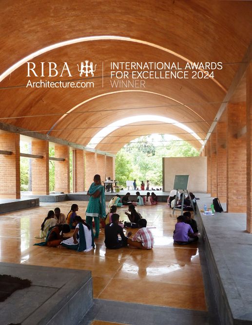 children's workshop under large earth vault filled with light at sharanam pondicherry